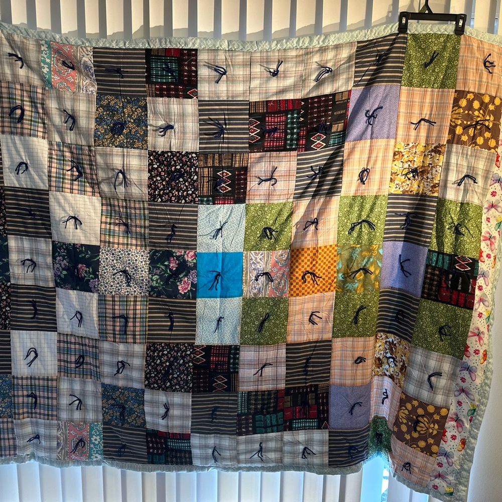 Neutral Patchwork Quilt with Textured Fabrics and Geometric Patterns